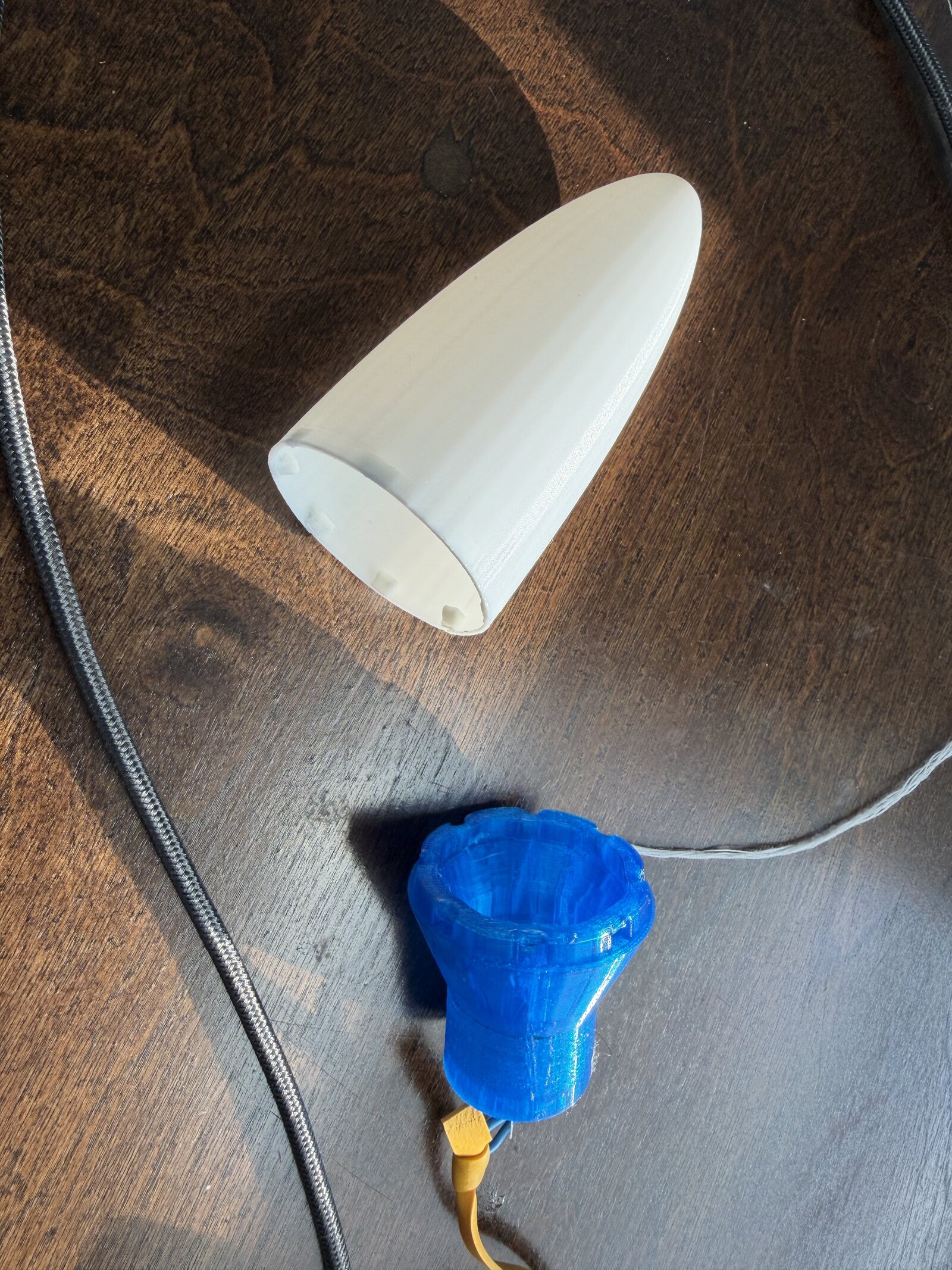 Nose cone and blue TPU adapter separated